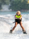 Woman water skiing at the lake