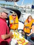 Man teaching boat safety.