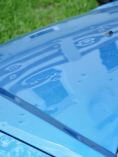 Hail damaged car hood