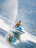 Man riding a jet ski.