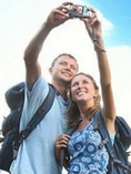 Young man and woman travelers