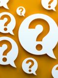 A bunch of white question marks on a mustard-yellow background.