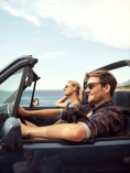 Two people driving in a car